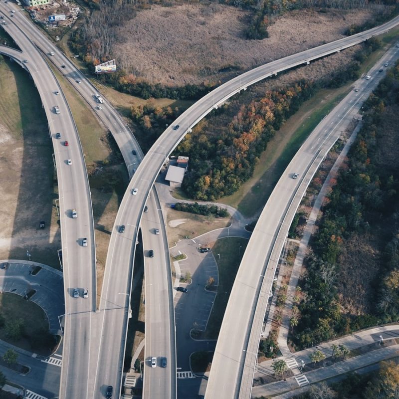 aerial photography of cars on concrete road during daytime